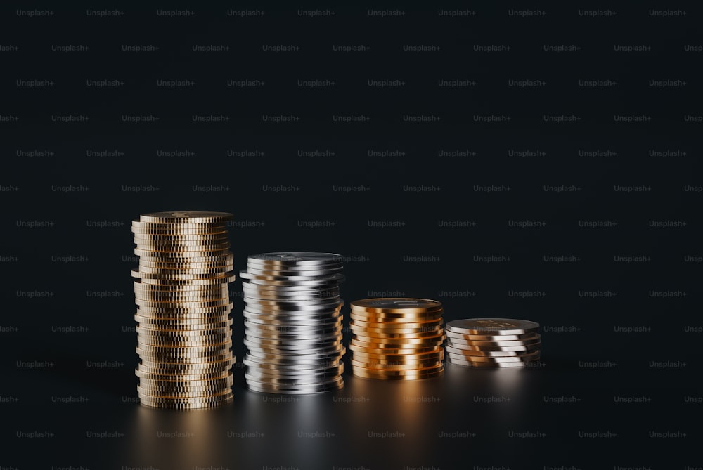 a stack of gold and silver coins on a black background