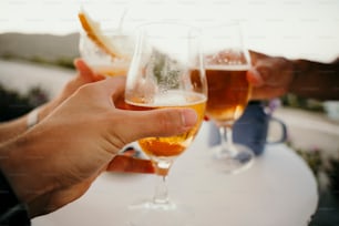 Caucasian friends drinking cocktails while on summer vacation. High quality photo