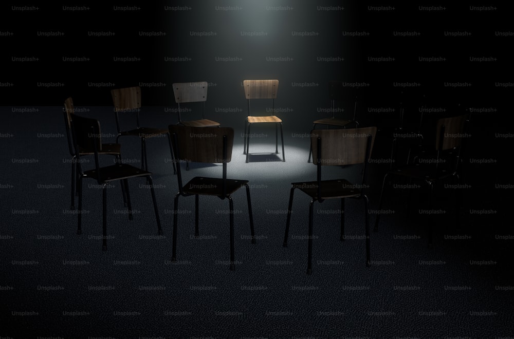 어두운 배경에 하나의 변덕스러운 스포트라이트로 강조 표시된 하나의 의자가 있는 원형 형태의 의자 그룹의 3D 렌더링 개념