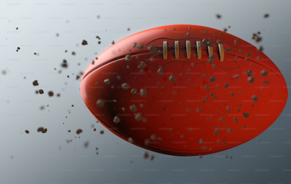 A dirty orange aussie rules ball caught in slow motion flying through the air scattering dirt particles in its wake - 3D render