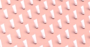 a lot of white tubes on a pink background