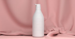 a white bottle sitting on top of a pink cloth