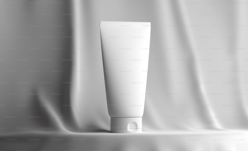 a tube of cream on a white background