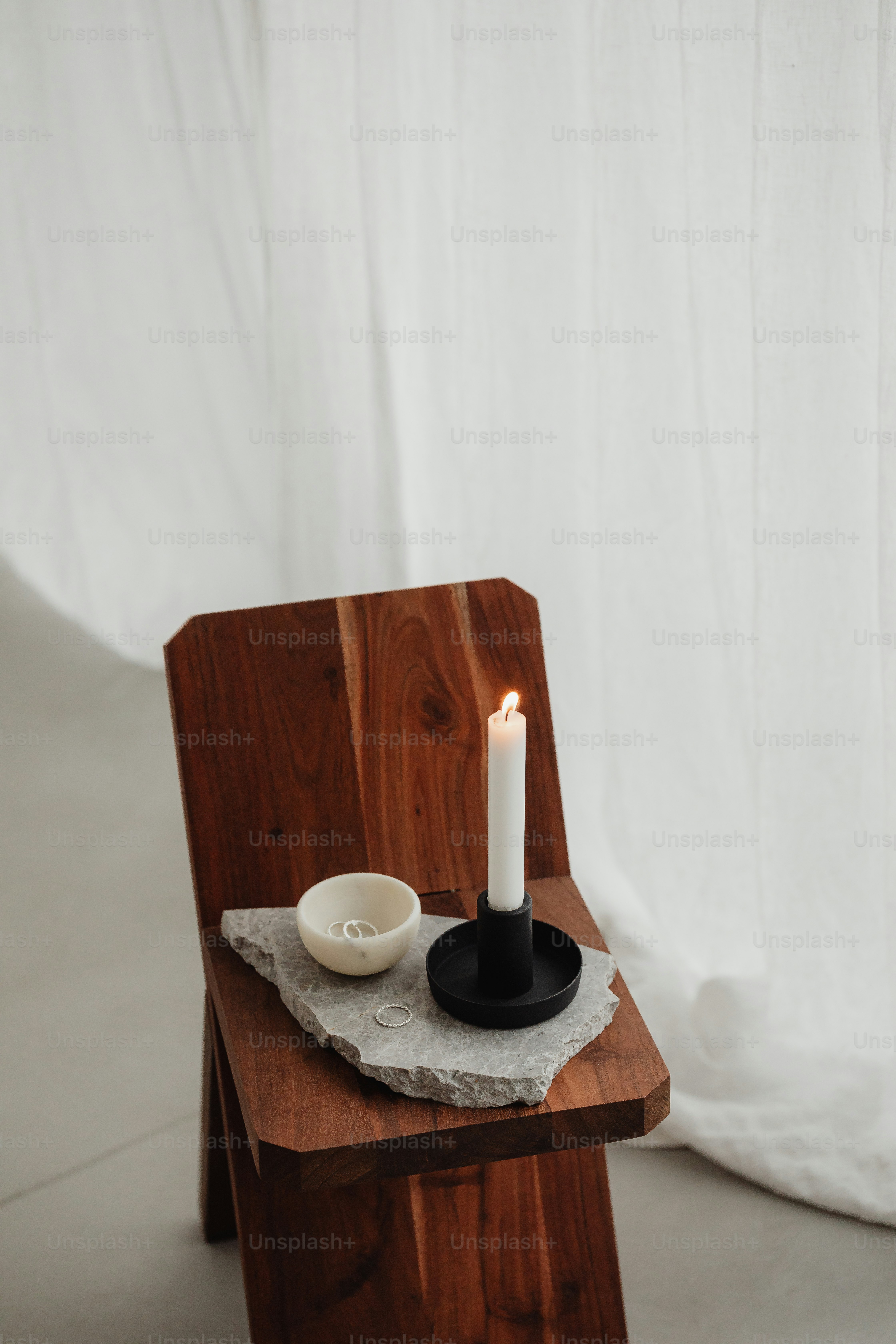 A wooden chair with a candle on top of it photo – Texture Image on Unsplash