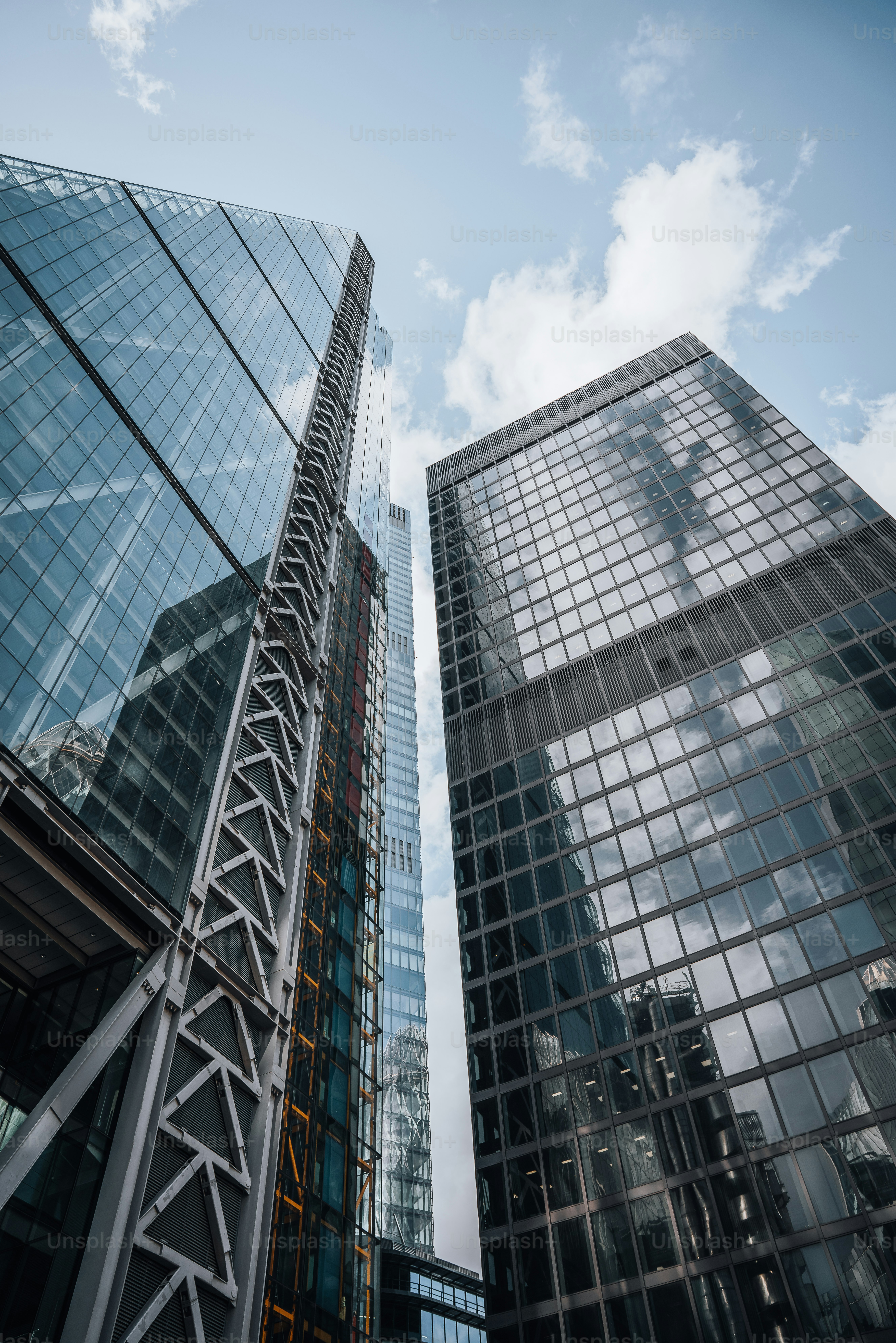 a couple of tall buildings sitting next to each other