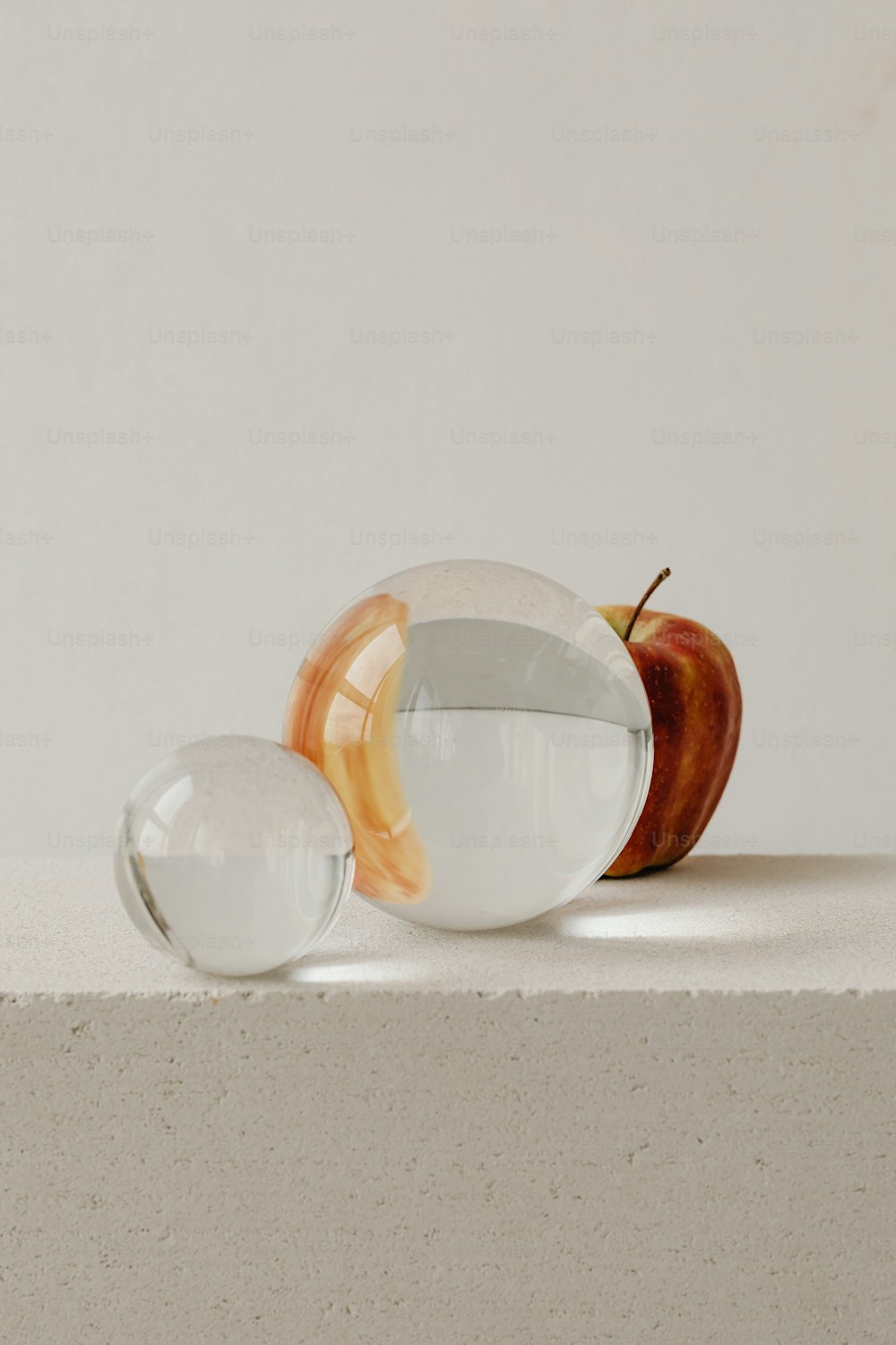 a couple of glass bowls sitting on top of a counter