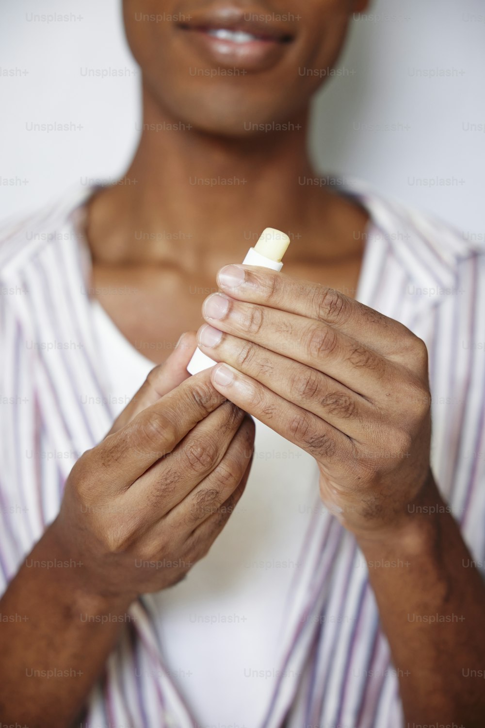 a close up of a person holding a piece of food