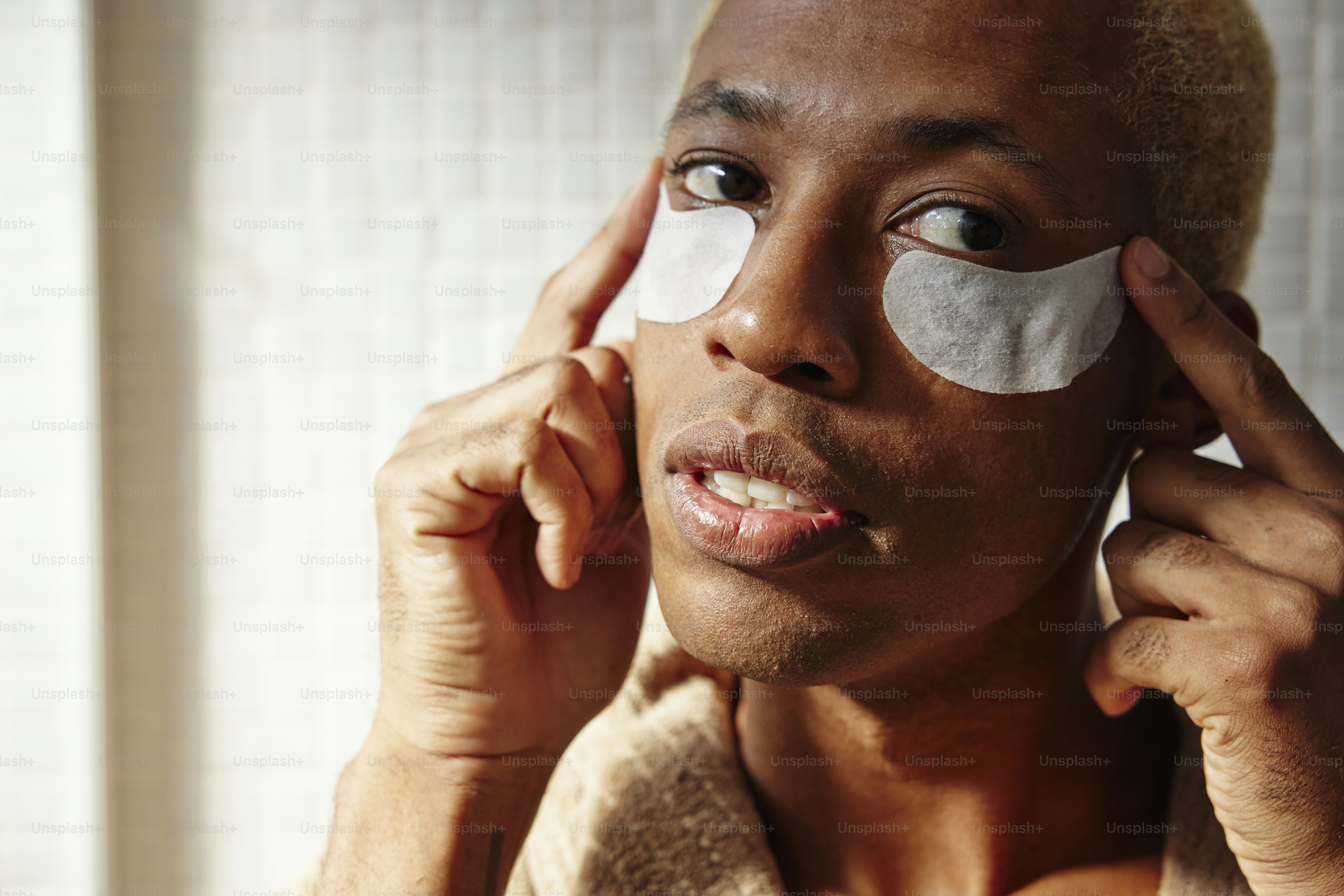 A man with a patch on his face photo – Mask Image on Unsplash