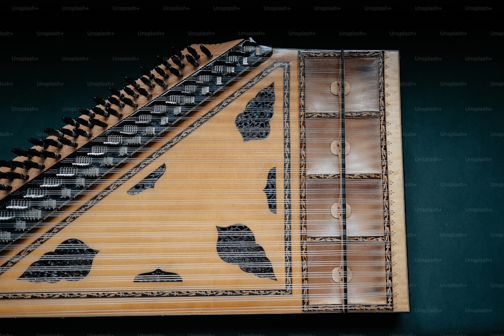 a close up of a musical instrument on a table