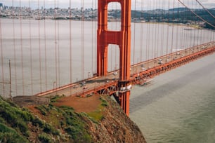 a view of the golden gate bridge from the top of a hill