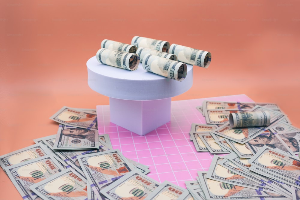 a bunch of money sitting on top of a table