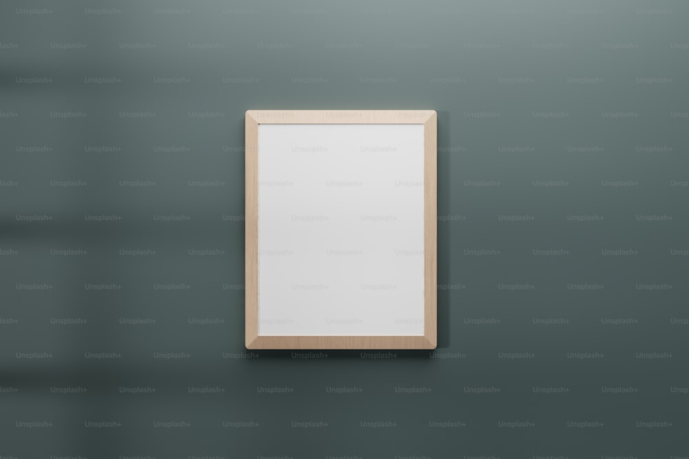 an empty picture frame hanging on a wall