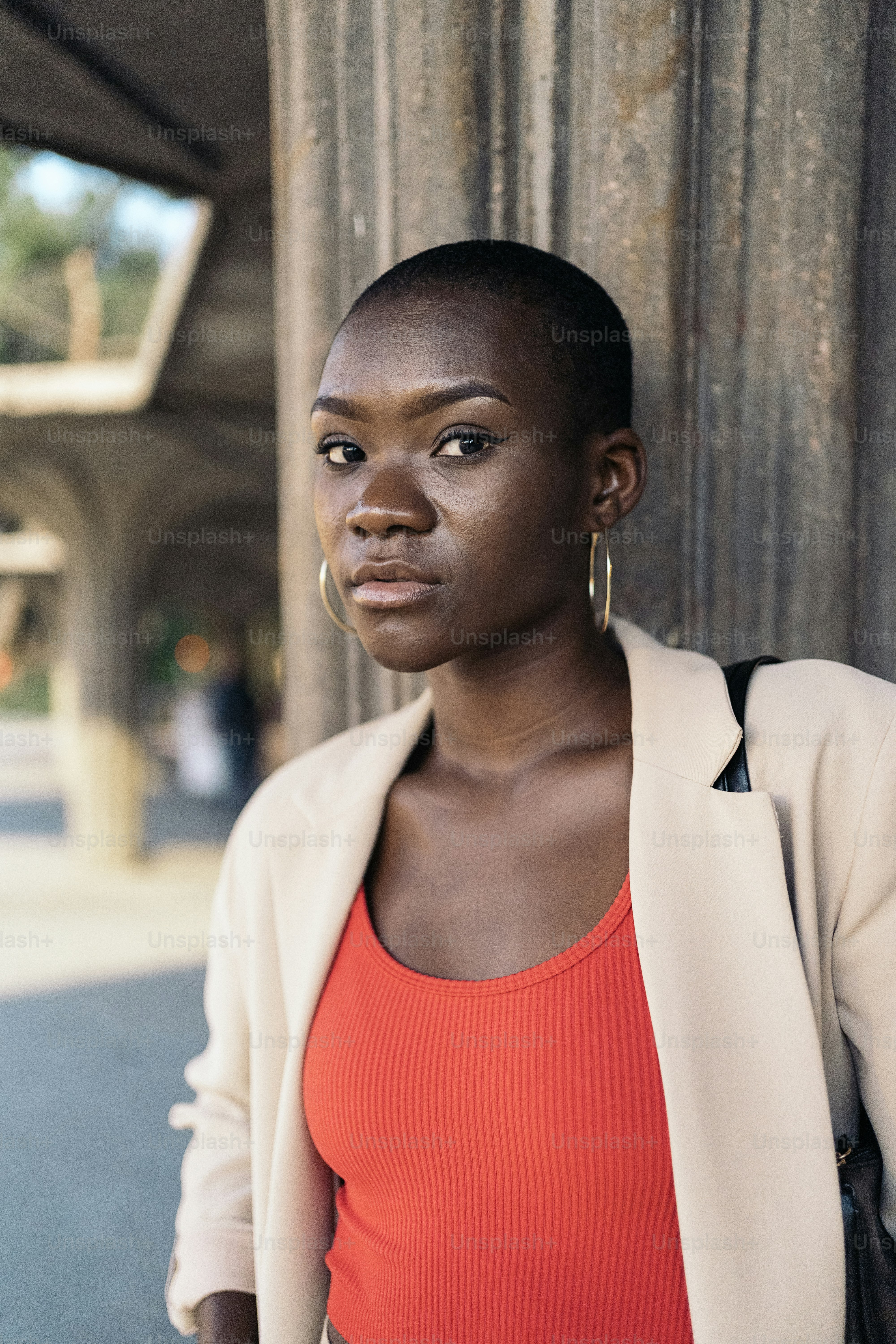 Low angle view of a stylish african american young adult woman with ...