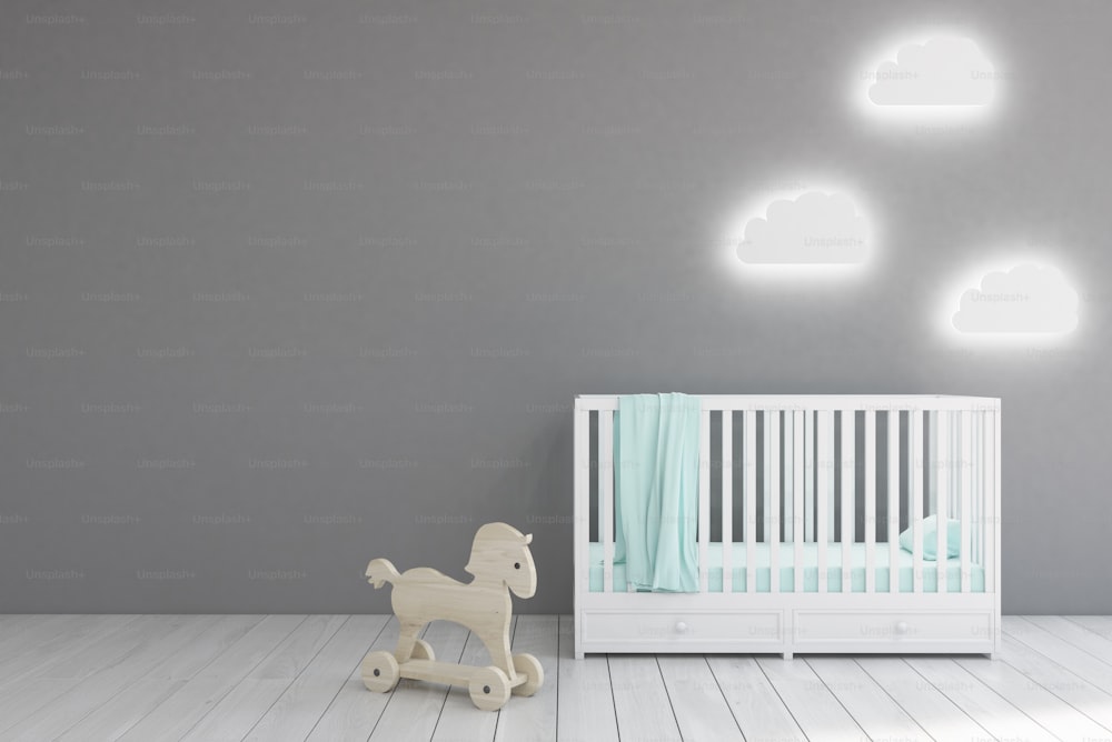Babyzimmer-Interieur mit einer Krippe, wolkenförmigen Lampen und einem Spielzeugpferd. Graue Wände. Konzept des Minimalismus. 3D-Rendering. Mock-up.