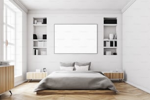 Interior of a modern luxury bedroom with white walls, a large bed in the center of the room, two bookcases by its sides, a large window and a framed horizontal poster. 3d rendering mock up