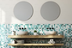 Close up of a double sink standing on a wooden shelf with two round mirrors above it. A green and white wall. A shelf with rolled and folded towels under them. 3d rendering