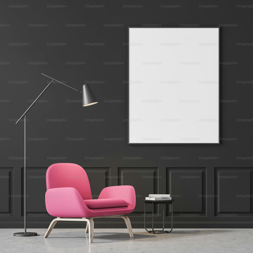Minimalistic living room interior with black walls, concrete floor and pink armchair standing near small table with books with a floor lamp above it. Vertical poster. 3d rendering mock up