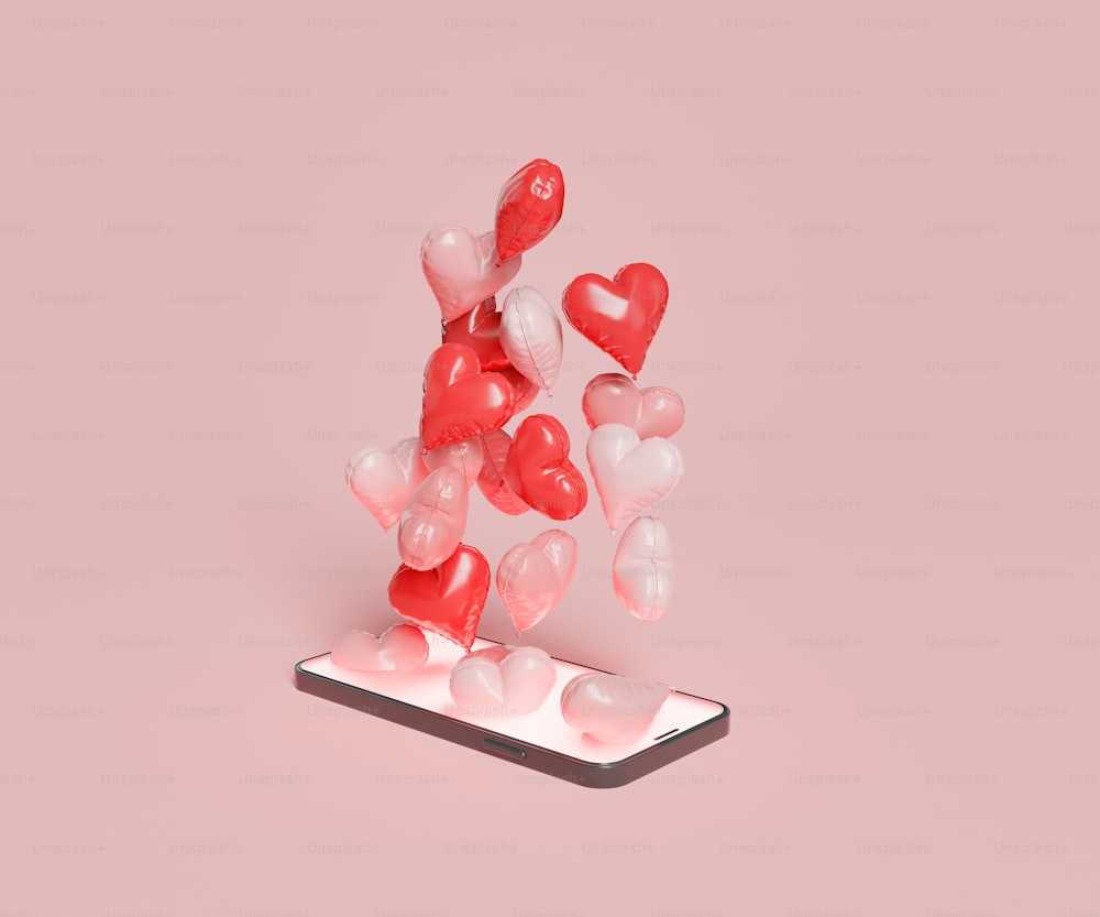 mobile phone with heart balloons coming out of the screen. valentine's day concept, technology, online dating and love. 3d rendering