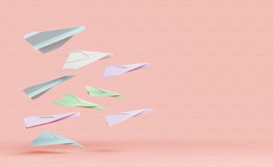 Aeroplani di carta colorata che avanzano su un lato e spazio per il testo. concetto di startup e formazione. Rendering 3D