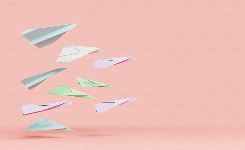 colored paper airplanes advancing on one side and space for text. startup concept and education. 3d rendering