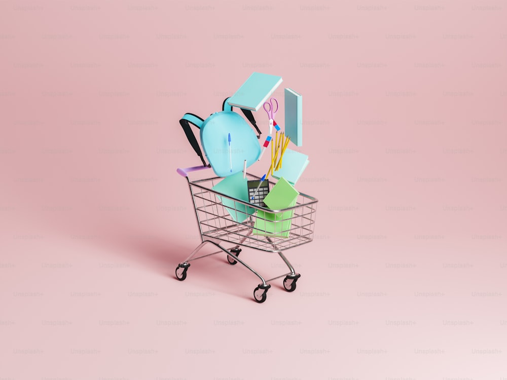 shopping cart with school supplies falling inside it with pastel red minimalistic background. concept of education, back to school and school shopping. 3d rendering