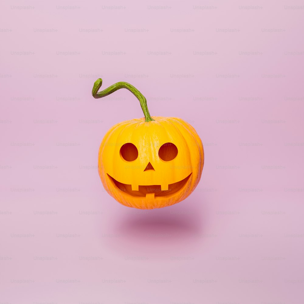 abóbora de halloween com rosto feliz e haste longa flutuando no fundo rosa mínimo. conceito de outono e noite das bruxas. Renderização 3D