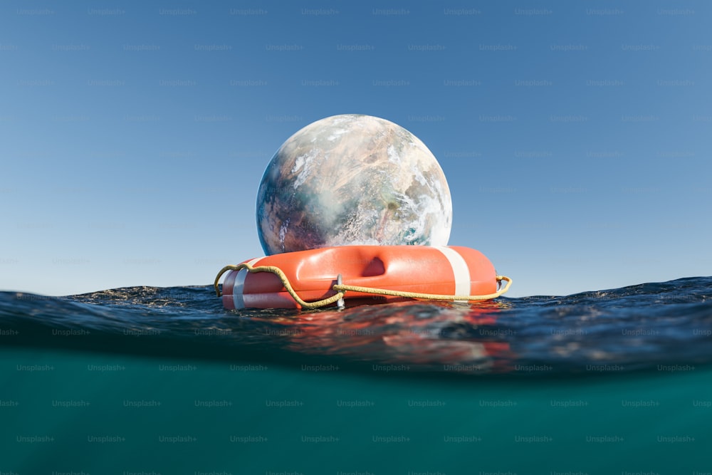 海に浮かぶ救命浮輪と、頂上に惑星があり、海底の景色を眺めることができます。気候変動、地球温暖化、環境、地球を救うというコンセプト。3Dレンダリング
