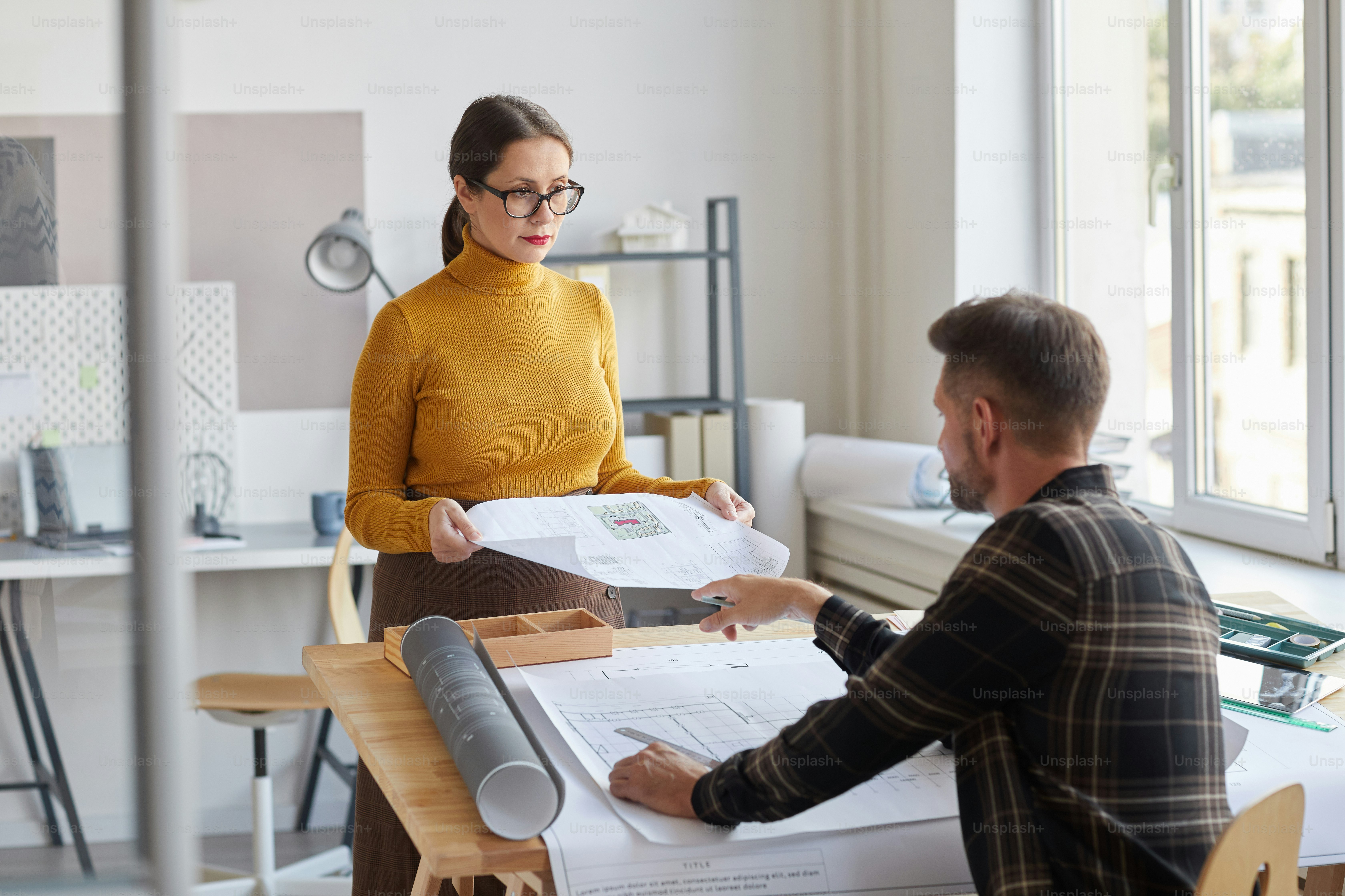 Architect planning on paper