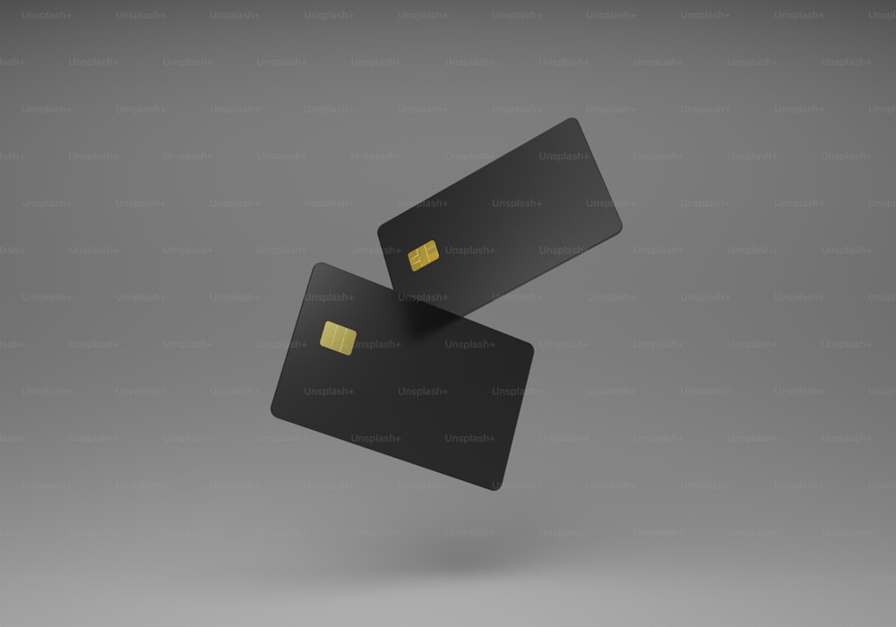 a black credit card flying through the air