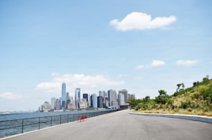 a view of a city skyline from a road