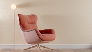 Una silla rosa sentada encima de un piso de madera dura
