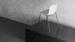 une chaise blanche posée sur une table noire