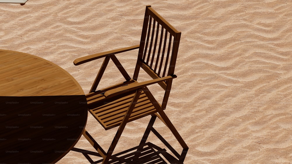 a chair and a table on a sandy beach