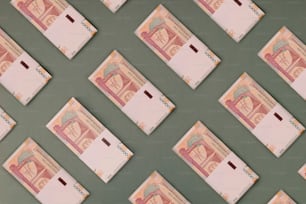 a bunch of indian currency laid out on a table