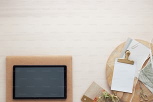 a flat screen tv sitting on top of a wooden table