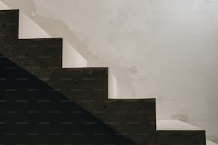 a man riding a skateboard down a set of stairs