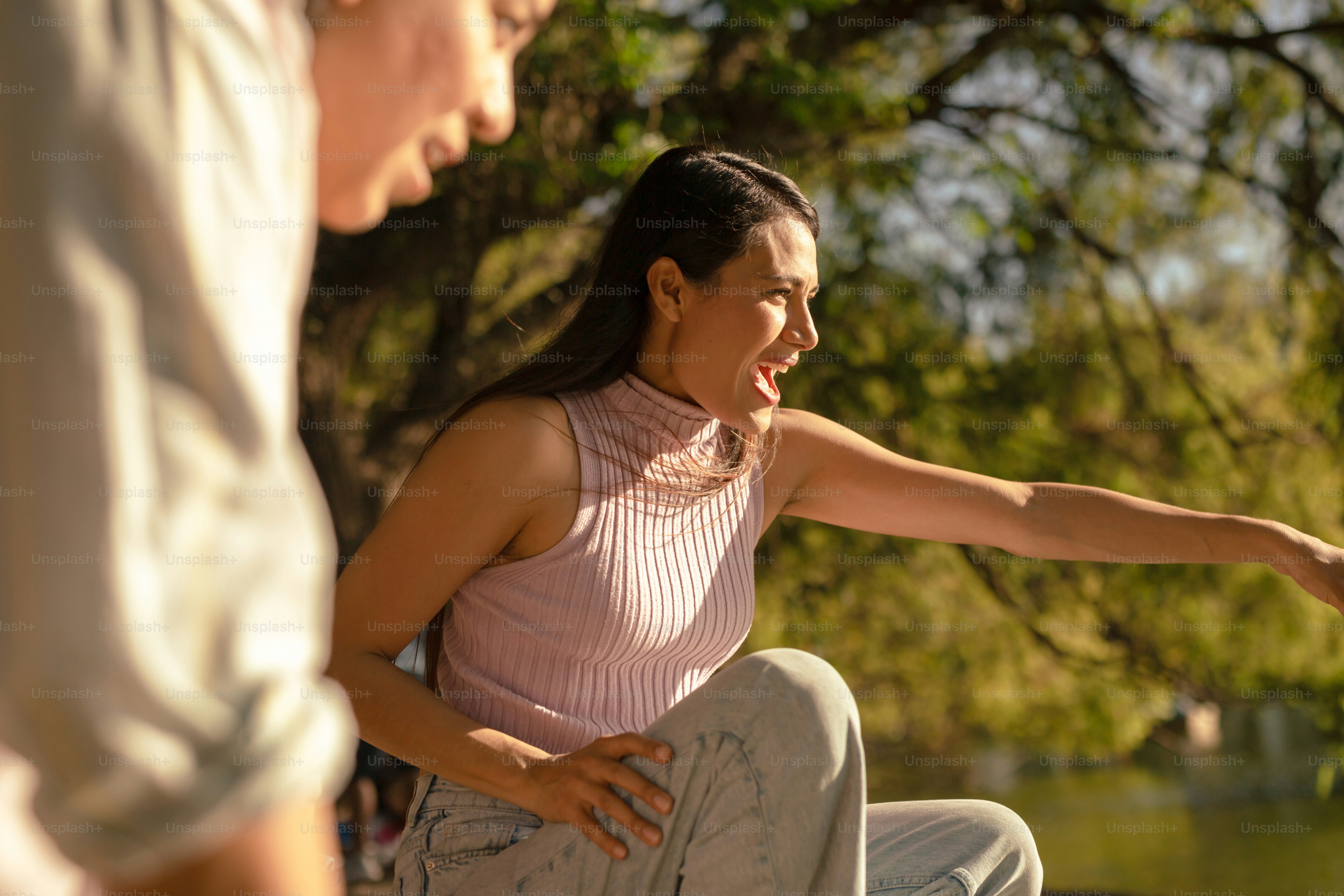 a man and a woman sitting next to each other