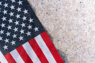 a close up of an american flag on a table