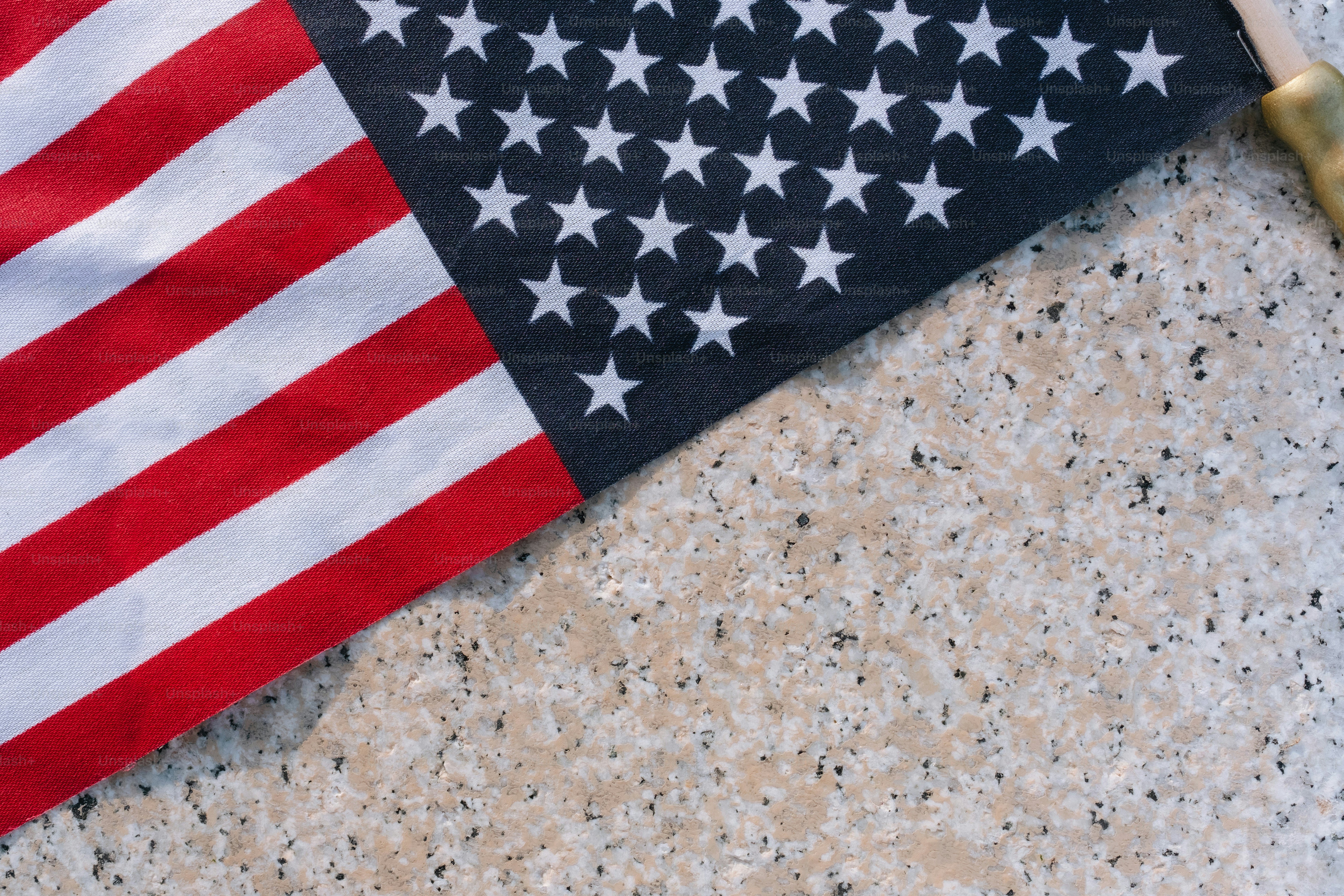 a close up of a american flag on a table