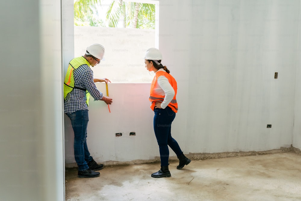 a couple of people that are standing in a room