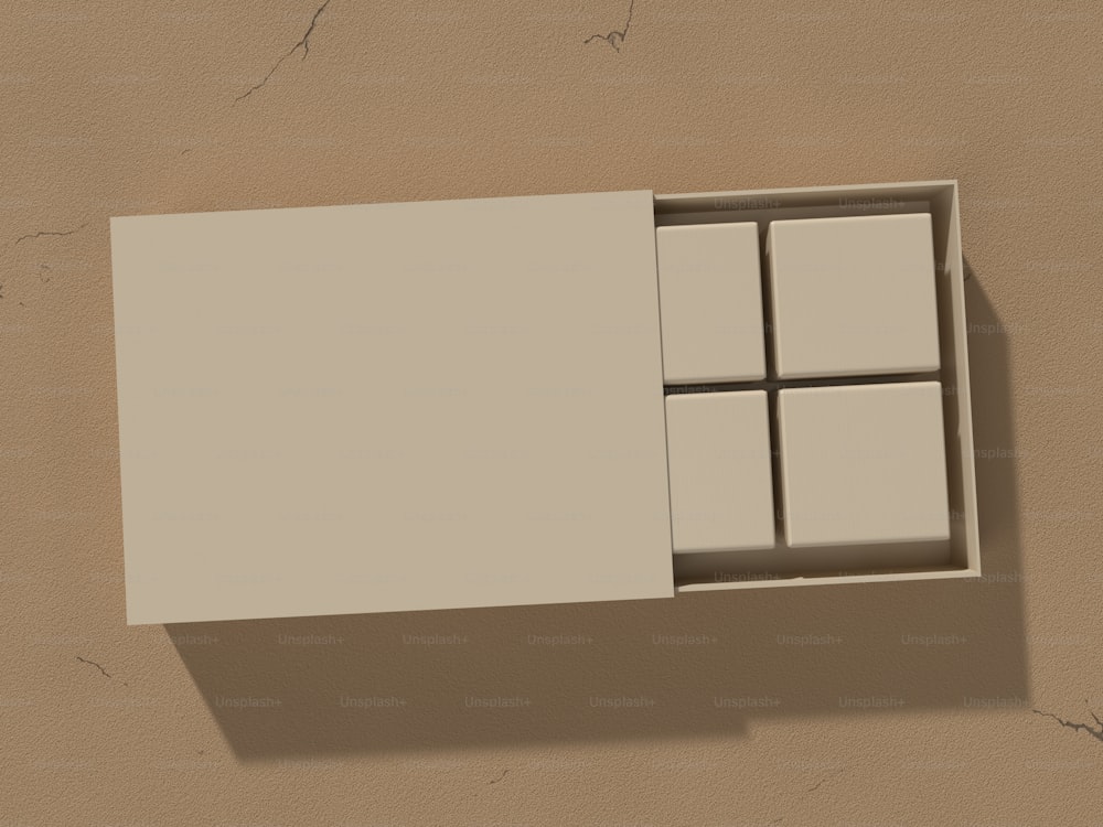 a white box with four square windows on a wall