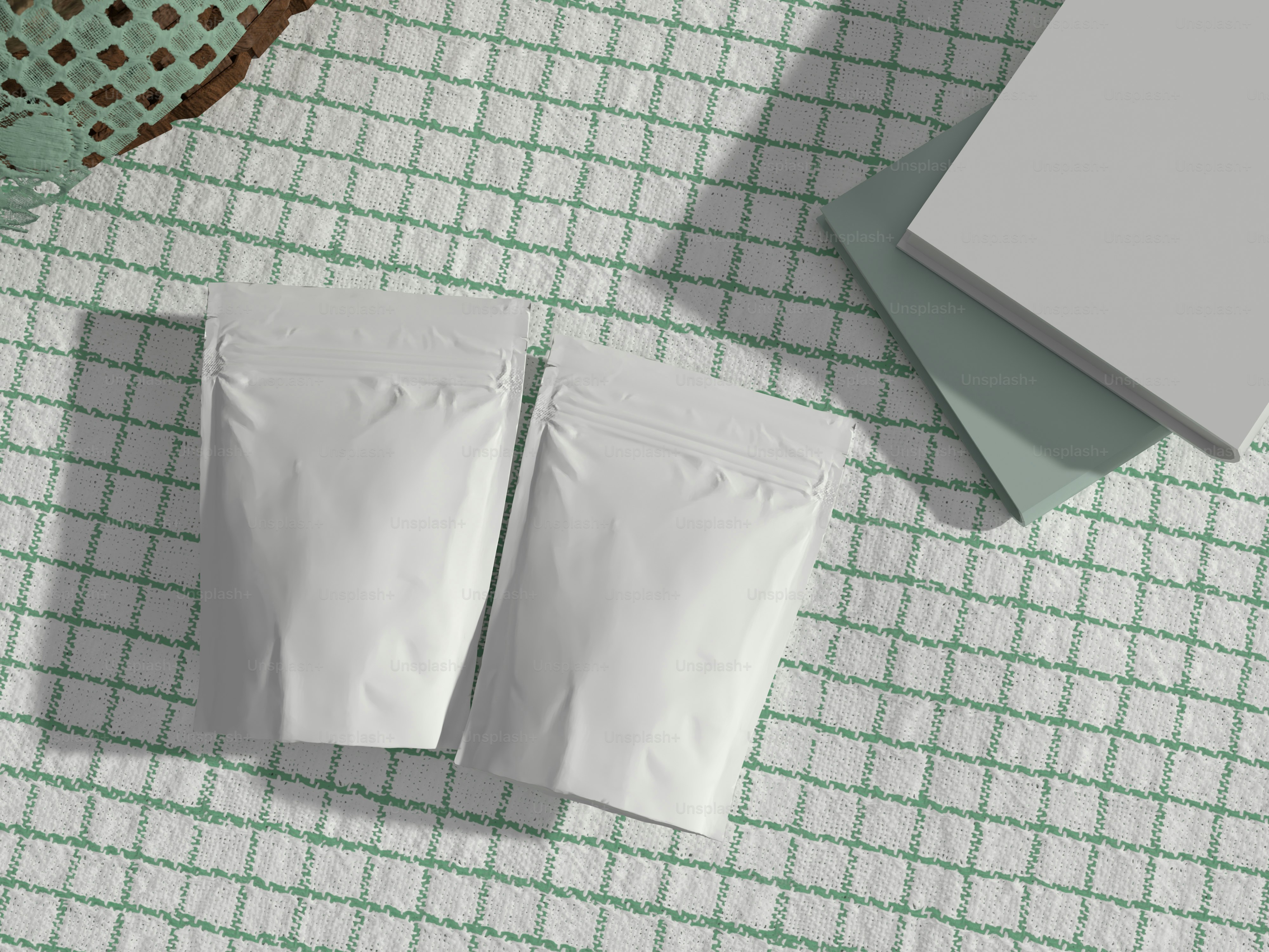 two bags of food sitting on top of a table