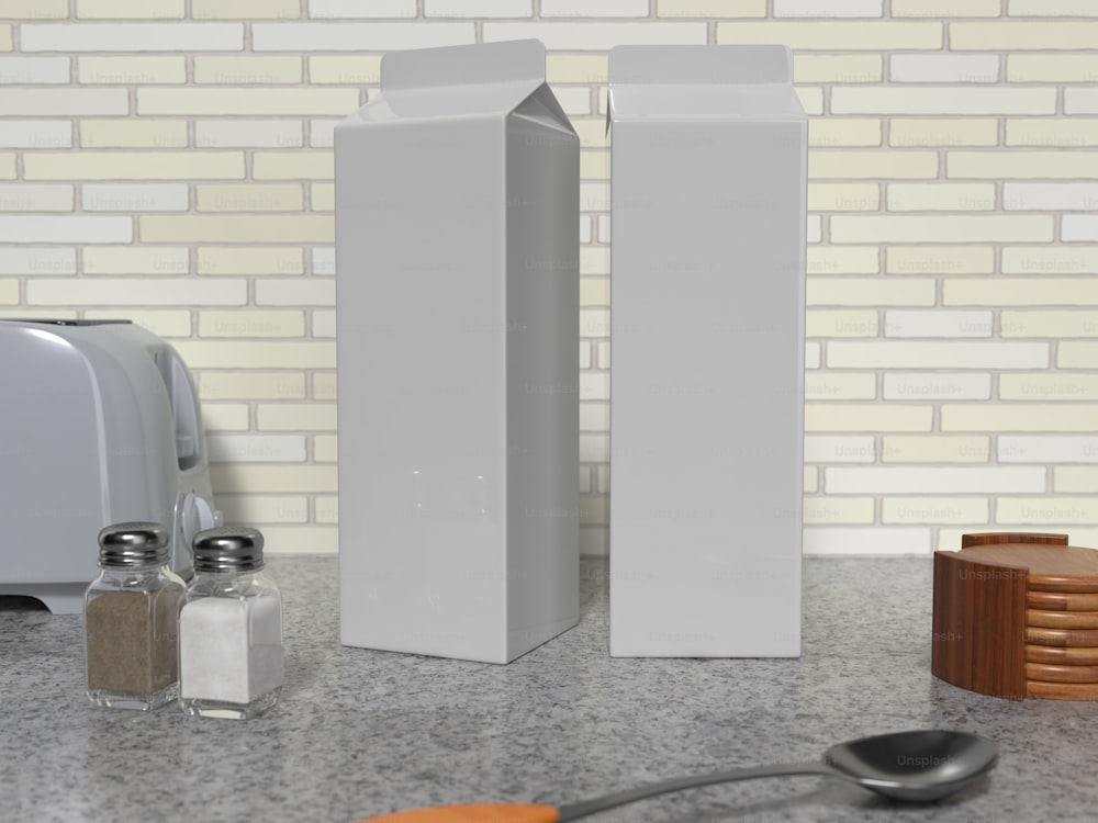 a pair of salt and pepper shakers sitting on a counter