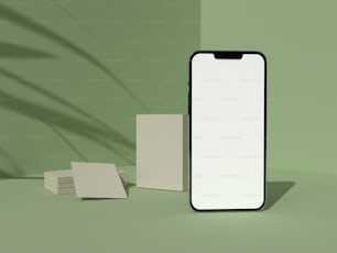 um telefone celular sentado ao lado de uma pilha de cartões