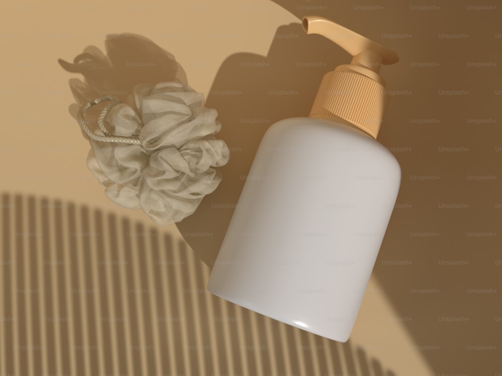 a bottle of lotion sitting next to a flower