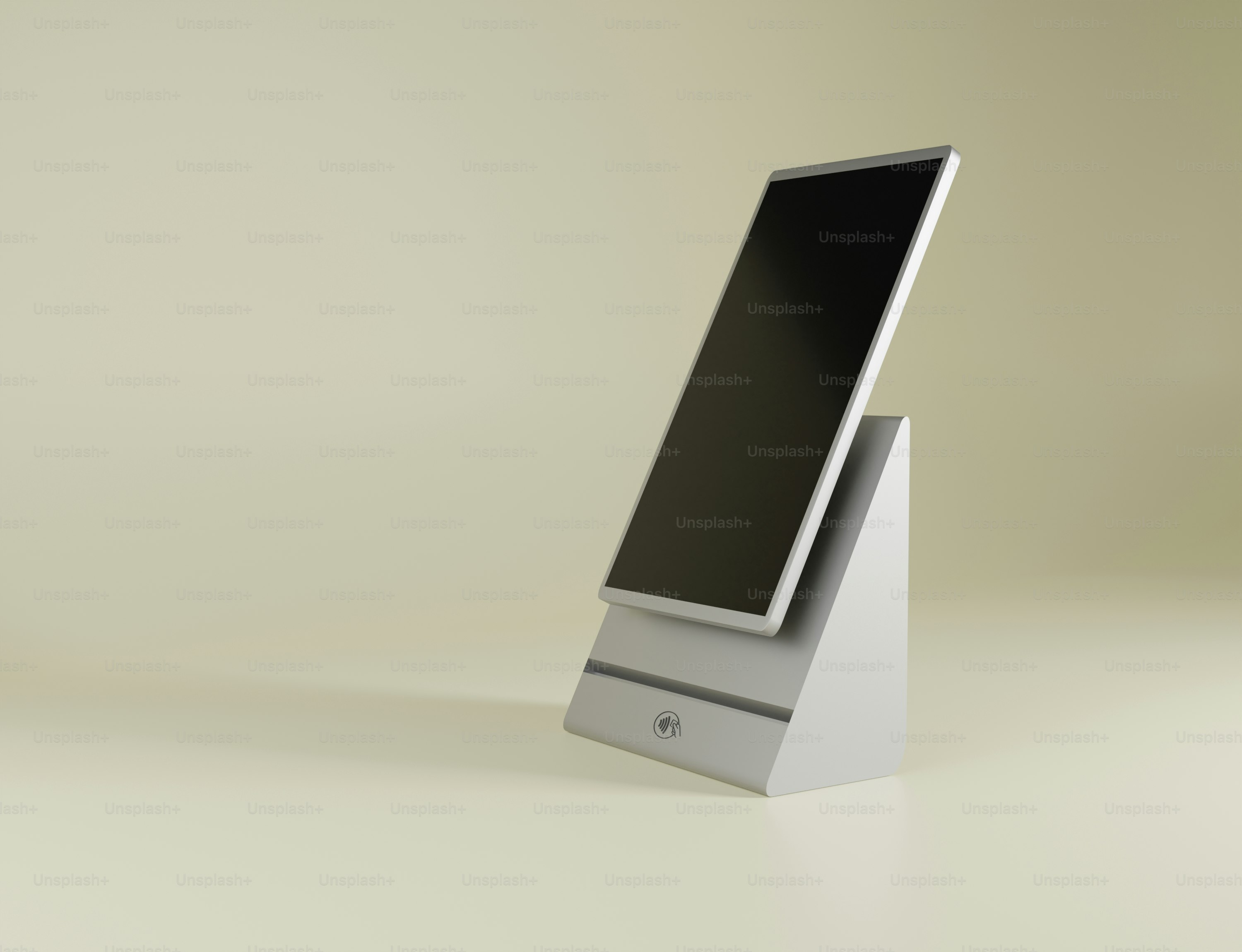 un écran d’ordinateur posé sur un support blanc