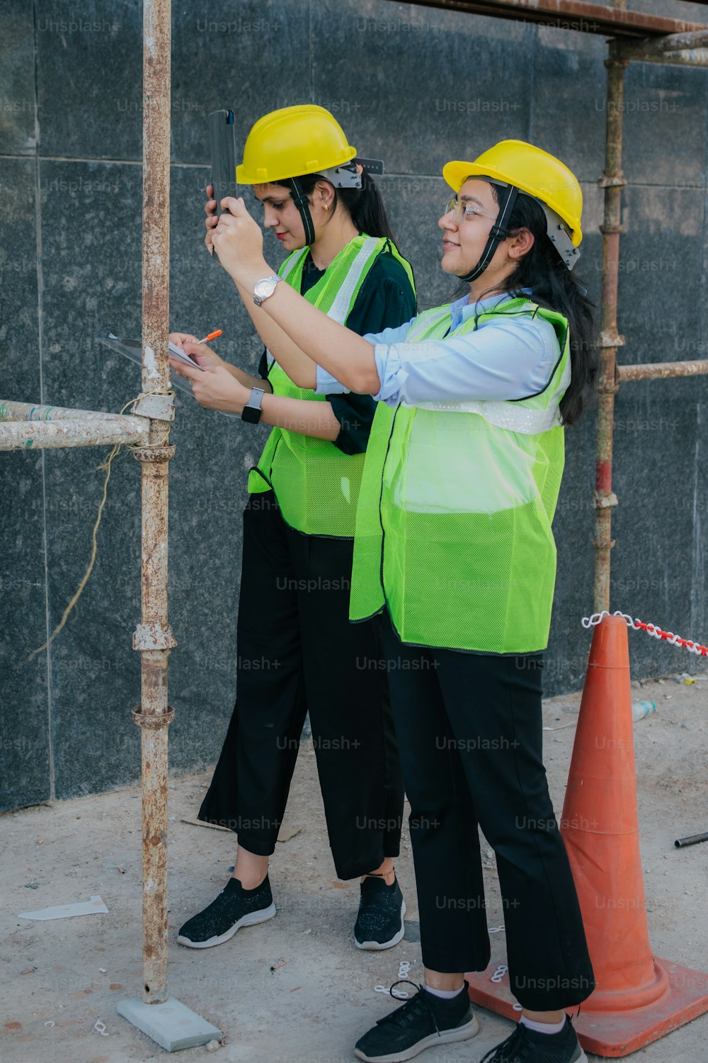 a couple of women standing next to each other