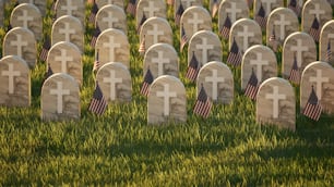 a field of headstones with american flags on them