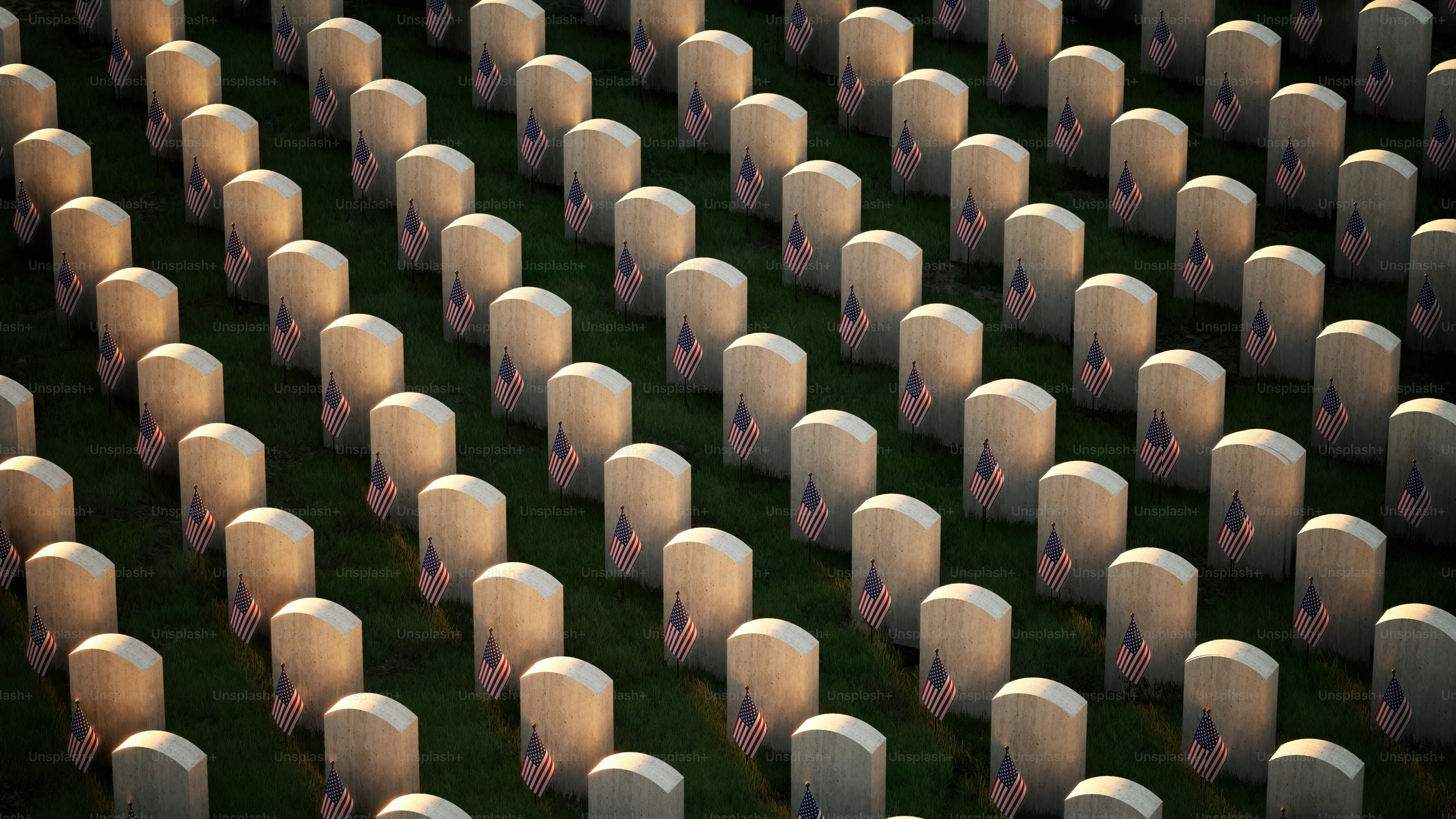 a large group of headstones in a cemetery