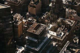 an aerial view of a city with tall buildings